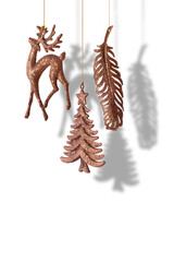 Christmas New Year suspended decorations. XMAS tree, deer and feather glitter toys on transparent background, png