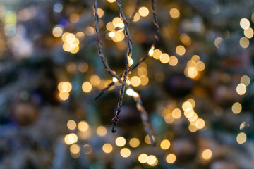 Vintage magical background with colorful bokeh. Defocused Christmas and New Year bokeh. Christmas and New Year concept.