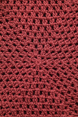 Burgundy crochet hexagon pattern. Crcohet ornament with holes.