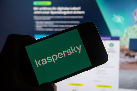 Rheinbach, Germany  28 November 2022,  The brand logo of the security software manufacturer "Kaspersky" on the display of a smartphone in front of the website (focus on the brand logo)