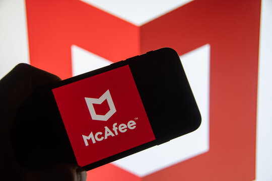 Rheinbach, Germany  28 November 2022,  The brand logo of the computer security software manufacturer "McAfee" on the display of a smartphone (focus on the brand logo)