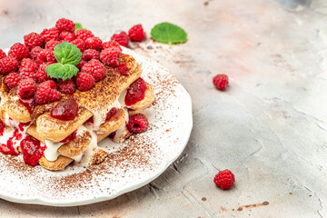 Berries Tiramisu Dessert cakes with raspberry and mint. Homemade dessert