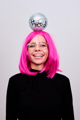 Woman with pink hair and disco ball