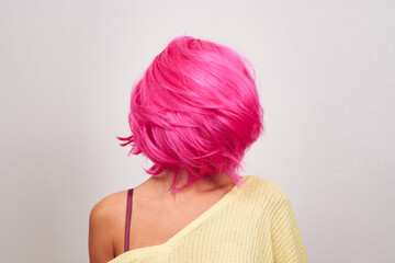 Portrait of a girl with pink hair