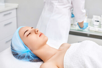 Obraz na płótnie Canvas woman at spa salon. female face with healthy skin