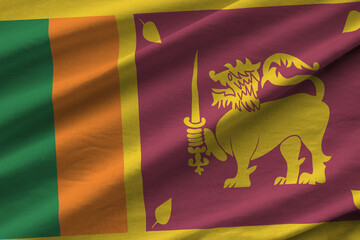 Sri Lanka flag with big folds waving close up under the studio light indoors. The official symbols...