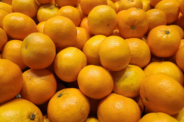 Stack of clementines on a market stall