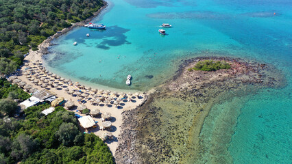 Aerial drone photo of tropical exotic paradise volcanic island complex bay with deep turquoise sea forming a blue lagoon archipelago visited by luxury yachts and sail boats