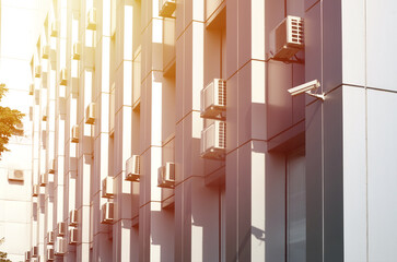Many HVAC air conditioning and ventilation systems on wall