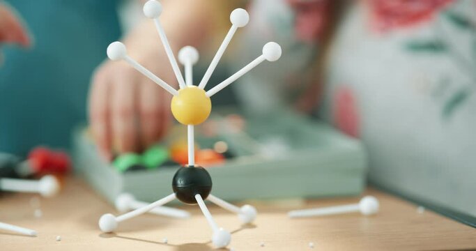 Molecule toys, children and kids science development tool for creative learning, science education and plastic atom particles tool. Physics, biology and chemistry academic lesson with molecules model