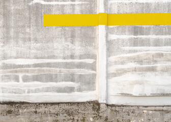 Minimalist abstract wallpaper with a simple yellow line, close up of a wall