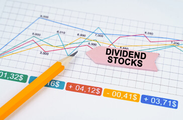On business charts there is a pencil and an arrow sticker with the inscription - Dividend stocks