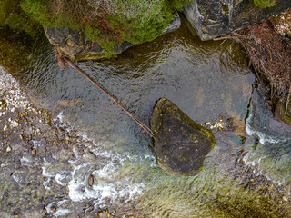 Aerial view of Sense river in Fribourg. Wild natural river flowing through deeply carved rocks.