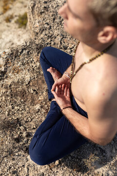 A Man Uses The Padmasana Posture, Meditating During A Yoga Session In The Countryside And Nature, To Connect Spiritually