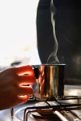 hot drink boiling and smoke from the steam. calm in wintertime