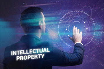 Business, technology, internet and network concept. Young businessman thinks over the steps for successful growth: Intellectual property