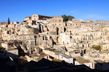 View of Sassi di Matera a historic district in the city of Matera, well-known for their ancient cave dwellings from the Belvedere di Murgia Timone, Basilicata, Italy