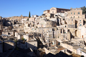 View of Sassi di Matera a historic district in the city of Matera, well-known for their ancient cave dwellings in Italy, Europe