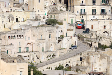Fototapeta na wymiar View of Sassi di Matera a historic district in the city of Matera, well-known for their ancient cave dwellings from the Belvedere di Murgia Timone, Basilicata, Italy