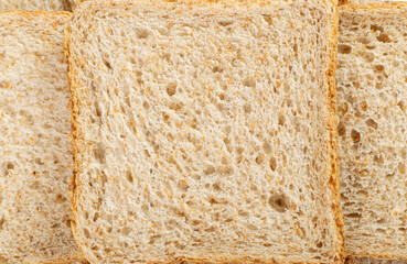 Whole Grain Healthy Sandwich Bread Texture Background Top View, Pattern of Brown Organic Cereal Bread
