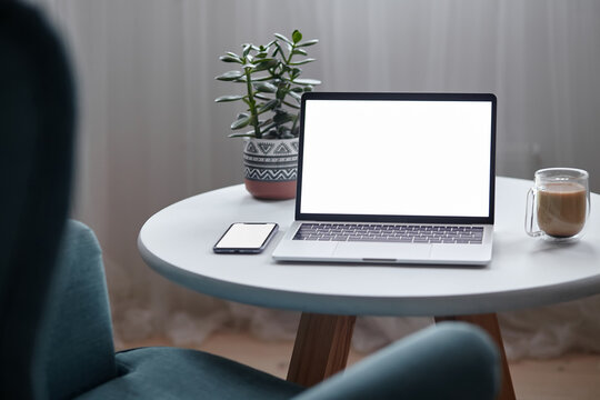 Close Up Laptop And Mobile Phone Screen Mockup On Table With Coffee Cup And Houseplant At Home, No People