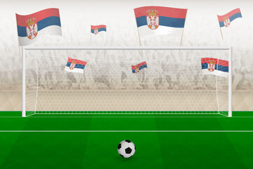 Serbia football team fans with flags of Serbia cheering on stadium, penalty kick concept in a soccer match.