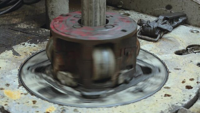 Drilling column on a turntable with a slipway. Drilling casing on a rotary table with a slipway on a gas derrick