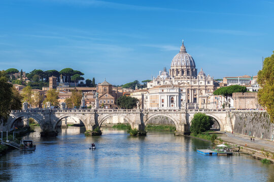 Rome landscape. Tiber River in Rome and St Peter Basilica in Vatican at sunny day, Rome Italy.	