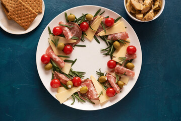 Christmas wreath of appetizer. Top view