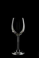 Empty wine glass on black background