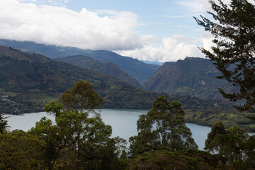 Naklejka na ściany i meble Colombian guavio region valley landscape with andean mountains range and guavio reservoir
