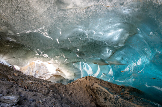 Natural cave below Aletsch glacier in Switzerland