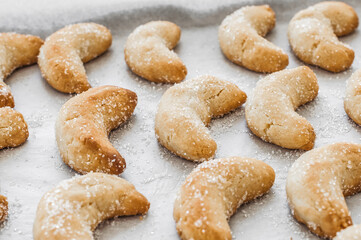 The shortbread tasty cookies on parchment closeup.