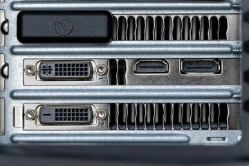 Closeup shot of firewire and small inputs on a digital computer workstation