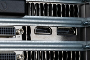 Closeup shot of firewire and small inputs on a digital computer workstation