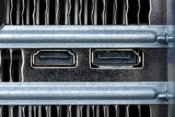 Closeup shot of firewire and small inputs on a digital computer workstation