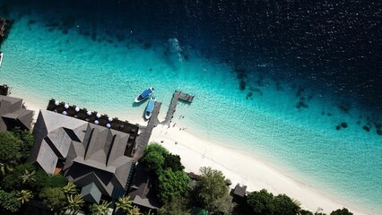 Naklejka premium View of stunning Mataking island coastline with sandy beach seen from the air, Malaysia