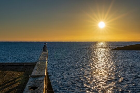 Beautiful sunset over the sea from the Tathra Wharf, NSW, Australia.