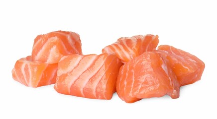 Pieces of fresh raw salmon on white background