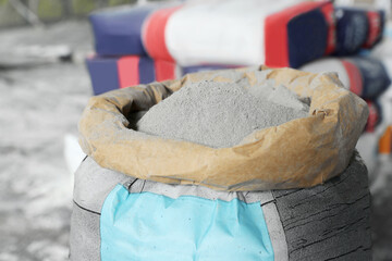 Cement powder in bag indoors, closeup view