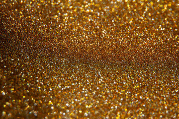 celebratory bokeh background, gold shine in middle of strip