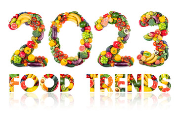 New year 2023 made of fruits and vegetables, fish. Healthy food. New year 2023 food trends. 2023...