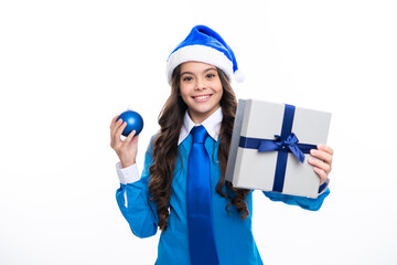 Teenager child with gift box. Present for winter holidays. Happy New Year or Christmas. Kid in sweater hold present box with gift ribbon bow.