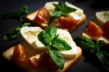 Bread, mozzarella cheese, cherry tomatoes