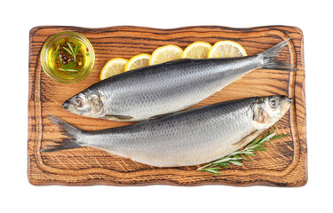 Wooden board with salted herrings, slices of lemon, oil and rosemary isolated on white, top view