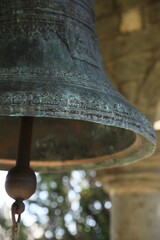 Obraz premium Closeup view of large old bell in tower
