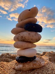 Fototapeta na wymiar zen stack of stones on the beach