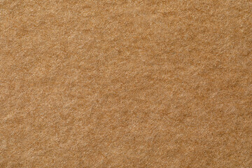 Texture of kraft paper sheet as background, closeup