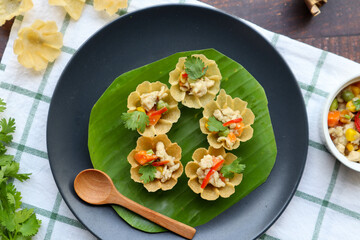 Kratong Thong - Mini crispy cup made from flour and filled with minced chicken and vegetable - Thai authentic appetizer