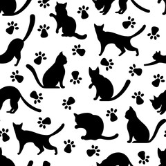 Silhouettes of black cats in various poses seamless vector pattern. Pets walk, play, hunt, sit, wash. Cute kittens and paw prints. Simple monochrome background with animals for fabric, wallpaper, web